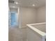 Upstairs hallway area with carpeted floors and neutral wall color at 10708 Oak Bend Dr, Parrish, FL 34219