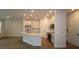 Spacious kitchen featuring an island, stainless steel appliances, and modern cabinetry at 10708 Oak Bend Dr, Parrish, FL 34219