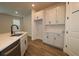 Kitchen features an island with a sink, and stainless steel appliances at 10708 Oak Bend Dr, Parrish, FL 34219