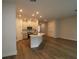 Open kitchen featuring an island and stainless steel appliances at 10708 Oak Bend Dr, Parrish, FL 34219