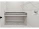 Clean and efficient laundry room featuring a granite countertop folding area at 10708 Oak Bend Dr, Parrish, FL 34219