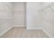Large walk-in closet with multiple levels of wire shelving at 10708 Oak Bend Dr, Parrish, FL 34219