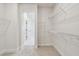 Spacious walk-in closet with built-in shelving for maximum storage at 10708 Oak Bend Dr, Parrish, FL 34219