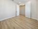 Bedroom with wood floors and double-door closet at 11443 Apple Tree Cir, Bradenton, FL 34211