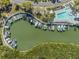 Stunning aerial view of the community marina, complete with pool and boat slips at 11450 Harbor Way # 5008, Largo, FL 33774