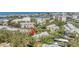 Aerial view of community featuring lush landscaping, complex and water views at 11450 Harbor Way # 5008, Largo, FL 33774