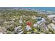 Aerial view of condo surrounded by trees and landscaping near the ocean at 11450 Harbor Way # 5008, Largo, FL 33774