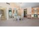 Cozy dining area featuring a glass top table and seating for four at 11450 Harbor Way # 5008, Largo, FL 33774