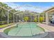 Screened-in pool area offering a private oasis with clear, inviting water at 1220 Darlington Oak Ne Cir, St Petersburg, FL 33703