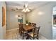 Cozy dining room with a wood table, seating for six, and natural light, perfect for Gathering meals at 12532 115Th St, Largo, FL 33778
