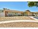 Charming single-story home featuring stone accents, a two-car garage, and a well-maintained lawn at 12532 115Th St, Largo, FL 33778