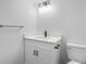 Updated bathroom with white vanity, modern faucet, and new toilet at 15307 Summerwind Dr, Tampa, FL 33624