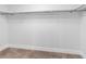 Walk-in closet featuring neutral colored carpeting and a closet rod at 15307 Summerwind Dr, Tampa, FL 33624
