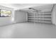 Spacious and clean garage with ample space for parking and storage at 15307 Summerwind Dr, Tampa, FL 33624