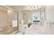Clean bathroom with a glass shower door and vanity with a mirror at 15324 Sherwood Forest Dr, Tampa, FL 33647
