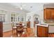 Cozy breakfast nook with backyard views and adjacent breakfast bar at 15324 Sherwood Forest Dr, Tampa, FL 33647