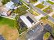 Overhead view of home, pool, and solar panels, showcasing the backyard, privacy fence, and adjacent parking area at 1820 Massachusetts Ne Ave, St Petersburg, FL 33703