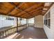 Spacious wooden patio with a wooden ceiling, offering a relaxing outdoor living space at 1820 Massachusetts Ne Ave, St Petersburg, FL 33703