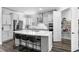 Well-equipped kitchen featuring a walk-in pantry, stainless appliances, and a large island with bar stool seating at 19204 Briarbrook Dr, Tampa, FL 33647