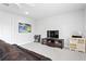 Bright living area with modern entertainment center and an electric drum kit at 19204 Briarbrook Dr, Tampa, FL 33647