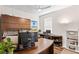 Bright office space with built in shelving, light wood floors, and large windows at 19204 Briarbrook Dr, Tampa, FL 33647