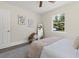 Comfortable bedroom with modern decor, stylish accents, and plenty of natural light at 1974 N Betty Ln, Clearwater, FL 33755