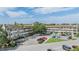View of community building featuring classic architecture, balconies, and meticulously landscaped surroundings at 2310 Denmark St # 30, Clearwater, FL 33763
