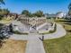 Beautiful park area with decorative colonnade and lush greenery, perfect for relaxation and community gatherings at 2310 Denmark St # 30, Clearwater, FL 33763