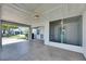 Open carport offering covered parking and access to the home's side entrance at 2313 Grenoble Pl # 2313, Sun City Center, FL 33573