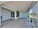 Sheltered carport featuring ample space and convenient access to the entryway at 2313 Grenoble Pl # 2313, Sun City Center, FL 33573