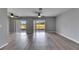 Bright living room boasts views from two sliding glass doors that let in abundant natural light at 2313 Grenoble Pl # 2313, Sun City Center, FL 33573