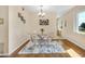 Dining area with glass table and chairs offering a modern and open atmosphere at 2458 Columbia Dr E # 84, Clearwater, FL 33763