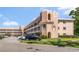 Charming condo building featuring a unique architectural design and well-maintained landscaping at 2458 Columbia Dr E # 84, Clearwater, FL 33763