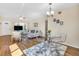 Inviting living room and dining area featuring hard wood floors and lots of natural light at 2458 Columbia Dr E # 84, Clearwater, FL 33763