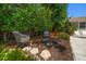Lush backyard setting with charming seating around a fire pit, creating a relaxing outdoor space at 246 20Th Ne Ave, St Petersburg, FL 33704