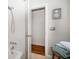 Bathroom featuring a shower-tub combination and a peek into the walk-in closet at 246 20Th Ne Ave, St Petersburg, FL 33704