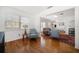 Inviting living room with hardwood floors, neutral seating, and bright natural light at 246 20Th Ne Ave, St Petersburg, FL 33704
