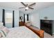 Spacious bedroom with large window and neutral decor at 2574 Hidden Cove Ln, Clearwater, FL 33763