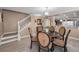 Elegant dining room featuring a round table, comfortable seating, and stylish decor at 2574 Hidden Cove Ln, Clearwater, FL 33763