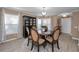 Elegant dining room featuring a round table, comfortable seating, and stylish decor at 2574 Hidden Cove Ln, Clearwater, FL 33763