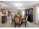 Elegant dining room featuring a round table, comfortable seating, and stylish decor at 2574 Hidden Cove Ln, Clearwater, FL 33763