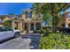 Charming two-story townhouse featuring a well-kept lawn and a quaint front porch at 2574 Hidden Cove Ln, Clearwater, FL 33763