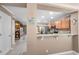 View of kitchen looking in from hall with lots of counter space at 2574 Hidden Cove Ln, Clearwater, FL 33763