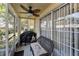 Outdoor patio with grill and wicker seating at 2574 Hidden Cove Ln, Clearwater, FL 33763