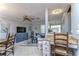 Cozy living room with comfortable seating, modern fan, and open layout at 2663 Sequoia Ter # 2663, Palm Harbor, FL 34683