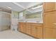 Spacious bathroom with a walk-in shower, double sinks, and plenty of cabinet space at 28628 Twinbrook # Ln, Wesley Chapel, FL 33543