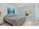 Comfortable bedroom with neutral tones, ceiling fan, and natural light from the window at 28628 Twinbrook # Ln, Wesley Chapel, FL 33543