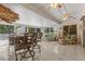 Bright sunroom with tile flooring and comfortable seating at 28628 Twinbrook # Ln, Wesley Chapel, FL 33543
