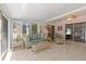 Cozy sunroom with ample natural light and comfortable seating at 28628 Twinbrook # Ln, Wesley Chapel, FL 33543