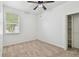 Bedroom with neutral carpet, closet and natural light from window at 3015 Azalea Blossom Dr, Plant City, FL 33567